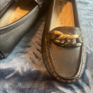 Anne Klein Black Pebbled Leather Loafers with Gold Chain Accent